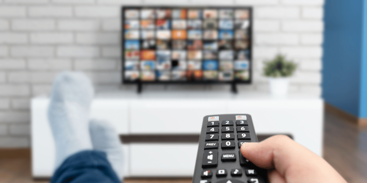 Person watching streaming TV which is a new advertising channel for small businesses